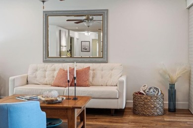 Discover luxury coastal living at its finest in this fully on Apollo Beach Golf and Sea Club in Florida - for sale on GolfHomes.com, golf home, golf lot