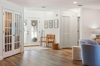 Discover luxury coastal living at its finest in this fully on Apollo Beach Golf and Sea Club in Florida - for sale on GolfHomes.com, golf home, golf lot
