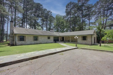 Luxurious brick home on the prestigious Texarkana Country Club on  in Arkansas - for sale on GolfHomes.com, golf home, golf lot