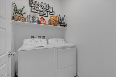 Light, bright and beautifully designed, this 3-bedroom, 3-bath on Tuscany Golf Club in Nevada - for sale on GolfHomes.com, golf home, golf lot