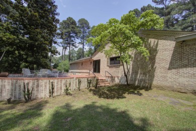 Luxurious brick home on the prestigious Texarkana Country Club on  in Arkansas - for sale on GolfHomes.com, golf home, golf lot