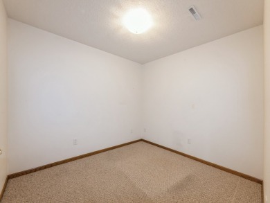 Ranch townhome that walks out to Deer Run Golf Course with 1440 on Deer Run Golf Club and DR in Iowa - for sale on GolfHomes.com, golf home, golf lot