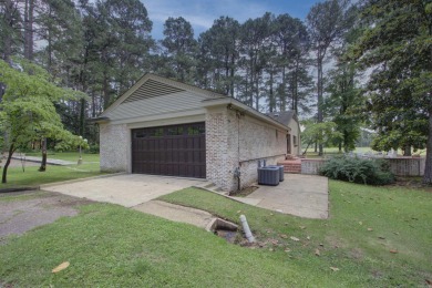 Luxurious brick home on the prestigious Texarkana Country Club on  in Arkansas - for sale on GolfHomes.com, golf home, golf lot