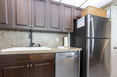 Escape to a life of luxury and relaxation in this stunning on Edgewater Beach Resort in Florida - for sale on GolfHomes.com, golf home, golf lot