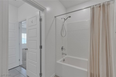 Light, bright and beautifully designed, this 3-bedroom, 3-bath on Tuscany Golf Club in Nevada - for sale on GolfHomes.com, golf home, golf lot