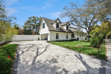 Step into this stunning West-Indies inspired luxury home crafted on Interlachen Country Club in Florida - for sale on GolfHomes.com, golf home, golf lot
