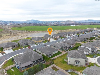 Experience luxury living in this beautifully crafted 4 BD, 3 BA on Horn Rapids Golf Club in Washington - for sale on GolfHomes.com, golf home, golf lot