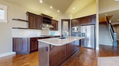 Experience luxury living in this beautifully crafted 4 BD, 3 BA on Horn Rapids Golf Club in Washington - for sale on GolfHomes.com, golf home, golf lot