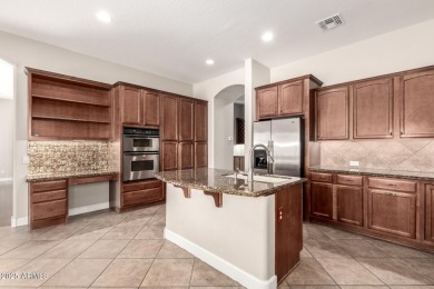RESORT STYLE LIVING AT ITS BEST! Stellar TW Lewis home in gated on Estrella Mountain Ranch Golf Course in Arizona - for sale on GolfHomes.com, golf home, golf lot