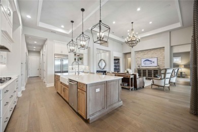 Step into a turnkey dream nestled in a prestigious GOLF on Ritz-Carlton Members Golf Club in Florida - for sale on GolfHomes.com, golf home, golf lot