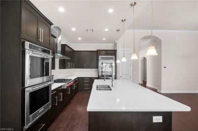 A Move-In-Ready Masterpiece with Stunning Water  Golf Views in on Spanish Wells Golf and Country Club in Florida - for sale on GolfHomes.com, golf home, golf lot