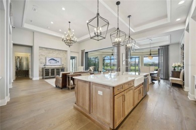 Step into a turnkey dream nestled in a prestigious GOLF on Ritz-Carlton Members Golf Club in Florida - for sale on GolfHomes.com, golf home, golf lot