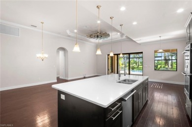 A Move-In-Ready Masterpiece with Stunning Water  Golf Views in on Spanish Wells Golf and Country Club in Florida - for sale on GolfHomes.com, golf home, golf lot
