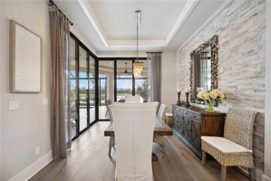 Step into a turnkey dream nestled in a prestigious GOLF on Ritz-Carlton Members Golf Club in Florida - for sale on GolfHomes.com, golf home, golf lot