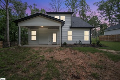 Welcome to this beautifully crafted 4-bedroom, 2.5-bathroom home on Pine Lake Golf Club in South Carolina - for sale on GolfHomes.com, golf home, golf lot