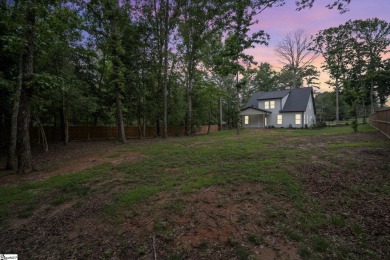 Welcome to this beautifully crafted 4-bedroom, 2.5-bathroom home on Pine Lake Golf Club in South Carolina - for sale on GolfHomes.com, golf home, golf lot