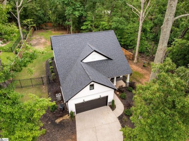 Welcome to this beautifully crafted 4-bedroom, 2.5-bathroom home on Pine Lake Golf Club in South Carolina - for sale on GolfHomes.com, golf home, golf lot