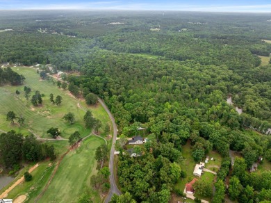 Welcome to this beautifully crafted 4-bedroom, 2.5-bathroom home on Pine Lake Golf Club in South Carolina - for sale on GolfHomes.com, golf home, golf lot