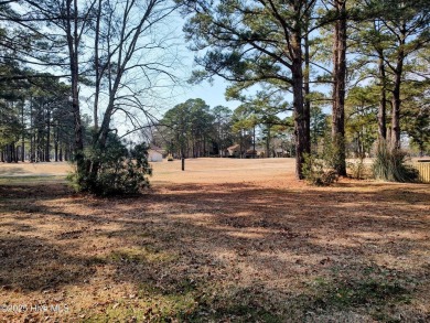 Discover this attractive two-story home boasting loads of curb on River Bend Golf and Country Club in North Carolina - for sale on GolfHomes.com, golf home, golf lot