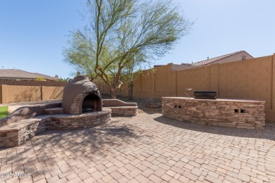 RESORT STYLE LIVING AT ITS BEST! Stellar TW Lewis home in gated on Estrella Mountain Ranch Golf Course in Arizona - for sale on GolfHomes.com, golf home, golf lot