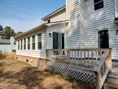 Discover this attractive two-story home boasting loads of curb on River Bend Golf and Country Club in North Carolina - for sale on GolfHomes.com, golf home, golf lot