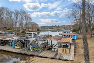 Experience the best of Lake Gaston waterfront living on Poplar on Tanglewood Shores Golf Club in Virginia - for sale on GolfHomes.com, golf home, golf lot