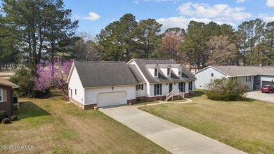 Discover this attractive two-story home boasting loads of curb on River Bend Golf and Country Club in North Carolina - for sale on GolfHomes.com, golf home, golf lot