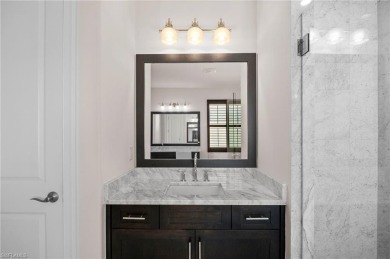 A Move-In-Ready Masterpiece with Stunning Water  Golf Views in on Spanish Wells Golf and Country Club in Florida - for sale on GolfHomes.com, golf home, golf lot