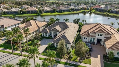 Step into a turnkey dream nestled in a prestigious GOLF on Ritz-Carlton Members Golf Club in Florida - for sale on GolfHomes.com, golf home, golf lot