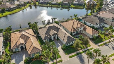 Step into a turnkey dream nestled in a prestigious GOLF on Ritz-Carlton Members Golf Club in Florida - for sale on GolfHomes.com, golf home, golf lot