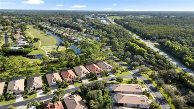 A Move-In-Ready Masterpiece with Stunning Water  Golf Views in on Spanish Wells Golf and Country Club in Florida - for sale on GolfHomes.com, golf home, golf lot