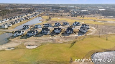 Stunning home overlooking the 15th green of Macatawa Legends on The Macatwa Legends Golf Course in Michigan - for sale on GolfHomes.com, golf home, golf lot