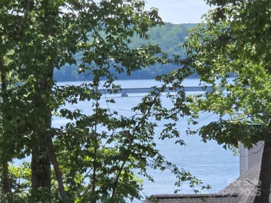 This premium Badin Lake water view lot is located in the on Old North State Club at Uwharrie Point Golf community in North Carolina - for sale on GolfHomes.com, golf home, golf lot