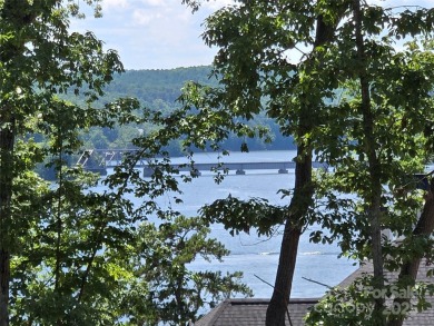 This premium Badin Lake water view lot is located in the on Old North State Club at Uwharrie Point Golf community in North Carolina - for sale on GolfHomes.com, golf home, golf lot