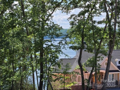 This premium Badin Lake water view lot is located in the on Old North State Club at Uwharrie Point Golf community in North Carolina - for sale on GolfHomes.com, golf home, golf lot
