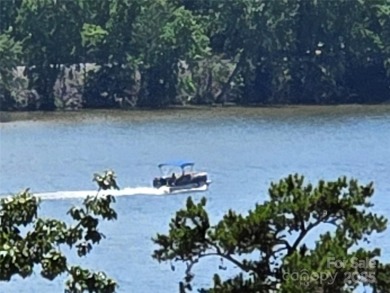 This premium Badin Lake water view lot is located in the on Old North State Club at Uwharrie Point Golf community in North Carolina - for sale on GolfHomes.com, golf home, golf lot