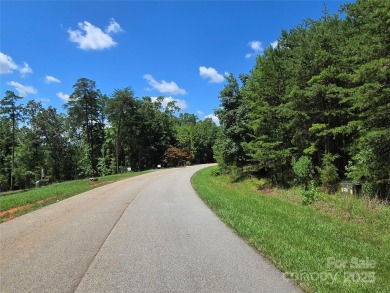 This premium Badin Lake water view lot is located in the on Old North State Club at Uwharrie Point Golf community in North Carolina - for sale on GolfHomes.com, golf home, golf lot
