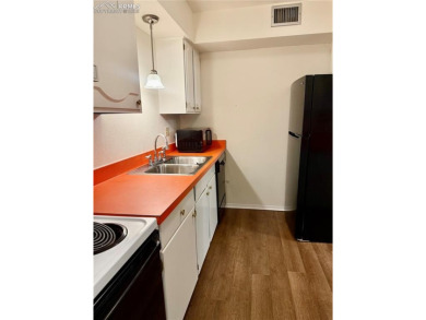 Step into this beautifully maintained ranch-style condo offering on Valley Hi Golf Course in Colorado - for sale on GolfHomes.com, golf home, golf lot
