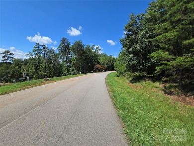 This premium Badin Lake water view lot is located in the on Old North State Club at Uwharrie Point Golf community in North Carolina - for sale on GolfHomes.com, golf home, golf lot