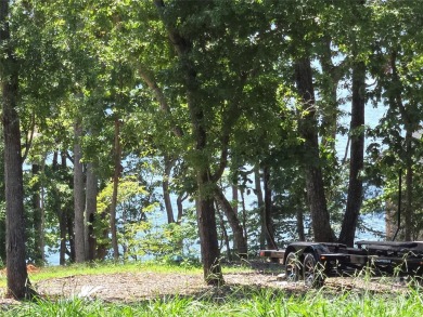 This premium Badin Lake water view lot is located in the on Old North State Club at Uwharrie Point Golf community in North Carolina - for sale on GolfHomes.com, golf home, golf lot