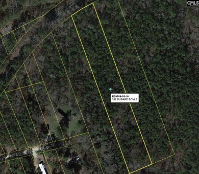 Experience the best of both worlds with this wooded lot located on Oak Hills Golf Club in South Carolina - for sale on GolfHomes.com, golf home, golf lot