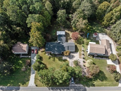 Welcome to 5207 Russell Rd--where space, style, and endless on Umstead Pines Golf and Swim At Willowhaven in North Carolina - for sale on GolfHomes.com, golf home, golf lot