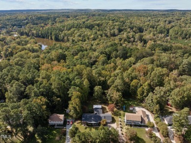 Welcome to 5207 Russell Rd--where space, style, and endless on Umstead Pines Golf and Swim At Willowhaven in North Carolina - for sale on GolfHomes.com, golf home, golf lot