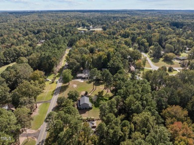 Welcome to 5207 Russell Rd--where space, style, and endless on Umstead Pines Golf and Swim At Willowhaven in North Carolina - for sale on GolfHomes.com, golf home, golf lot