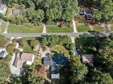 Welcome to 5207 Russell Rd--where space, style, and endless on Umstead Pines Golf and Swim At Willowhaven in North Carolina - for sale on GolfHomes.com, golf home, golf lot