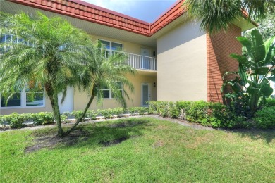 Adorable, updated 2BR/2BA first-floor unit in Vista Royale, a on The American Golf Club in Florida - for sale on GolfHomes.com, golf home, golf lot