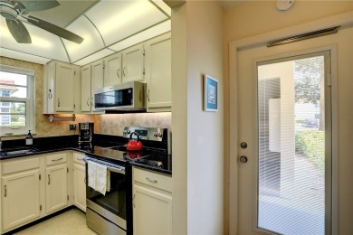 Adorable, updated 2BR/2BA first-floor unit in Vista Royale, a on The American Golf Club in Florida - for sale on GolfHomes.com, golf home, golf lot