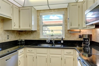 Adorable, updated 2BR/2BA first-floor unit in Vista Royale, a on The American Golf Club in Florida - for sale on GolfHomes.com, golf home, golf lot
