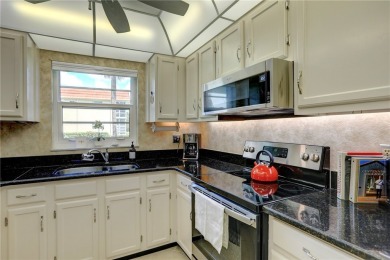 Adorable, updated 2BR/2BA first-floor unit in Vista Royale, a on The American Golf Club in Florida - for sale on GolfHomes.com, golf home, golf lot