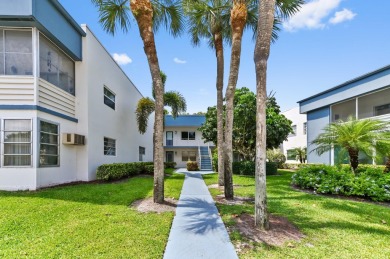 Enjoy breathtaking golf course and water views from this on Kings Point Golf -Flanders Way in Florida - for sale on GolfHomes.com, golf home, golf lot